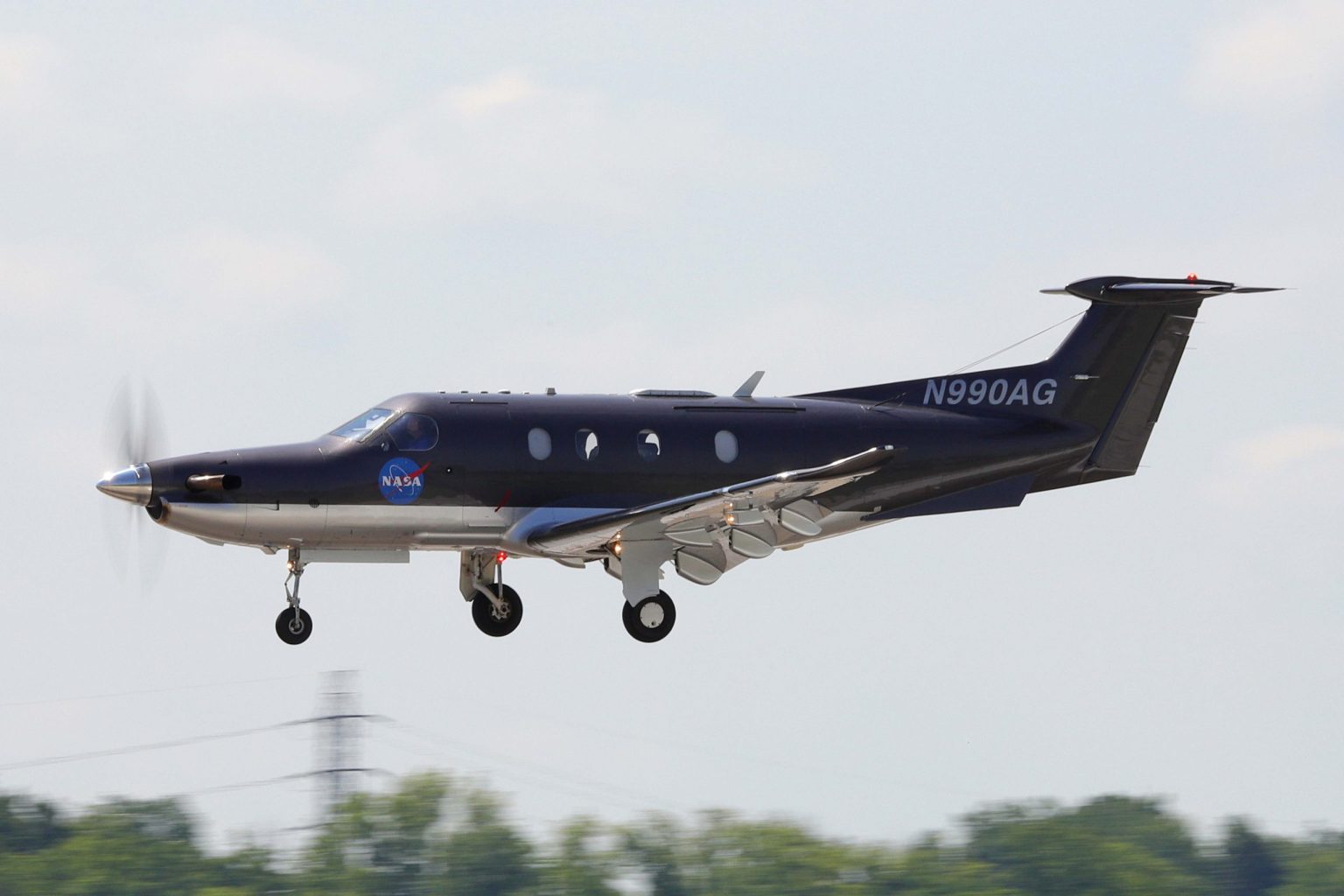 NASA's Pilatus PC-12NG research aircraft landing at Cleveland Hopkins International Airport